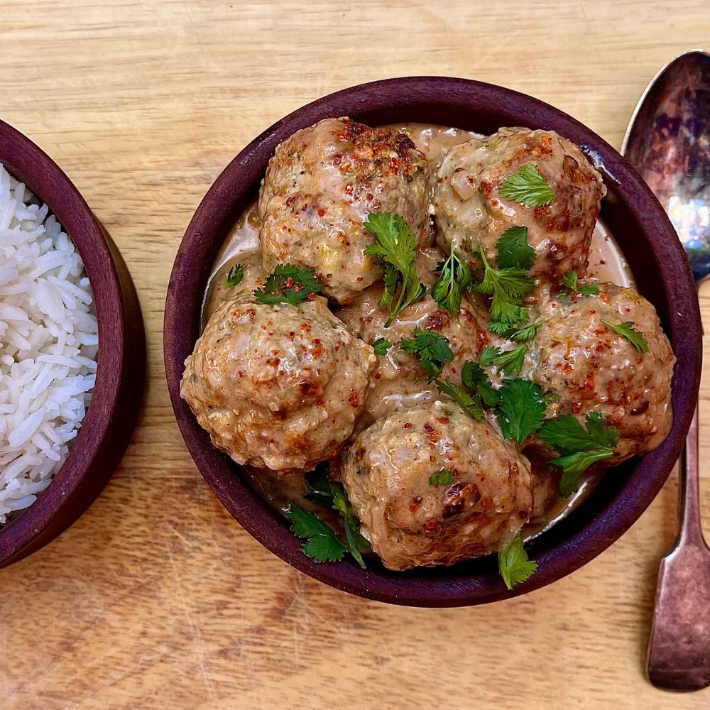 Frozen: Pork, ginger and sesame meatballs with coconut and tamarind. Serves two