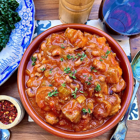 Frozen:  Slow-cooked pork with chorizo piccante, cider and black-eyed beans. Serves two.