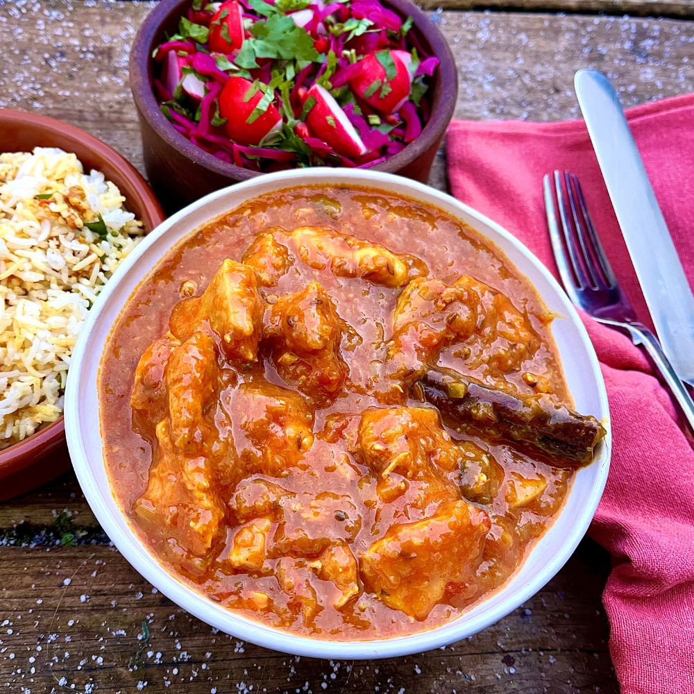 Frozen: Punjabi chicken curry with cinnamon, cardamom and tomato. Serves two