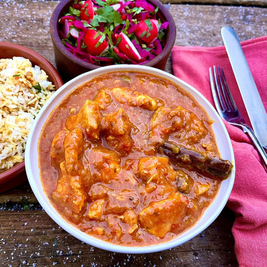 Frozen: Punjabi chicken curry with cinnamon, cardamom and tomato. Serves two