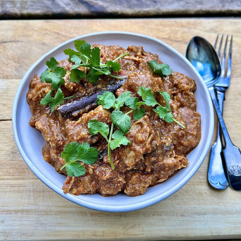 Frozen: Sri Lankan kalu pol pork curry with chilli and toasted coconut. Serves two