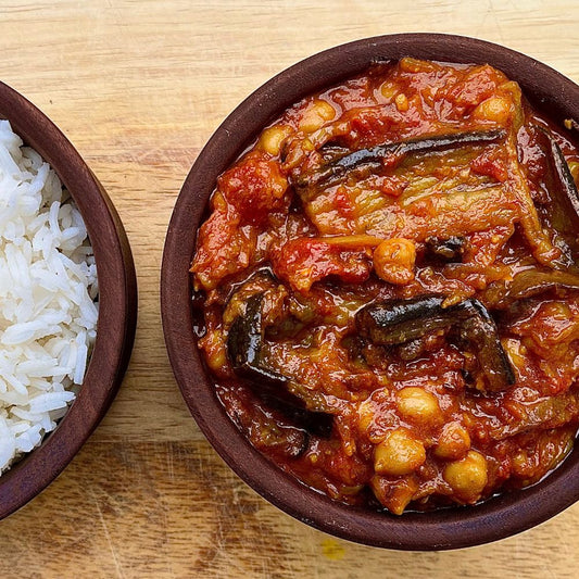 Frozen: Smoked aubergine and chickpea curry with tomato, chilli and cumin. Serves two